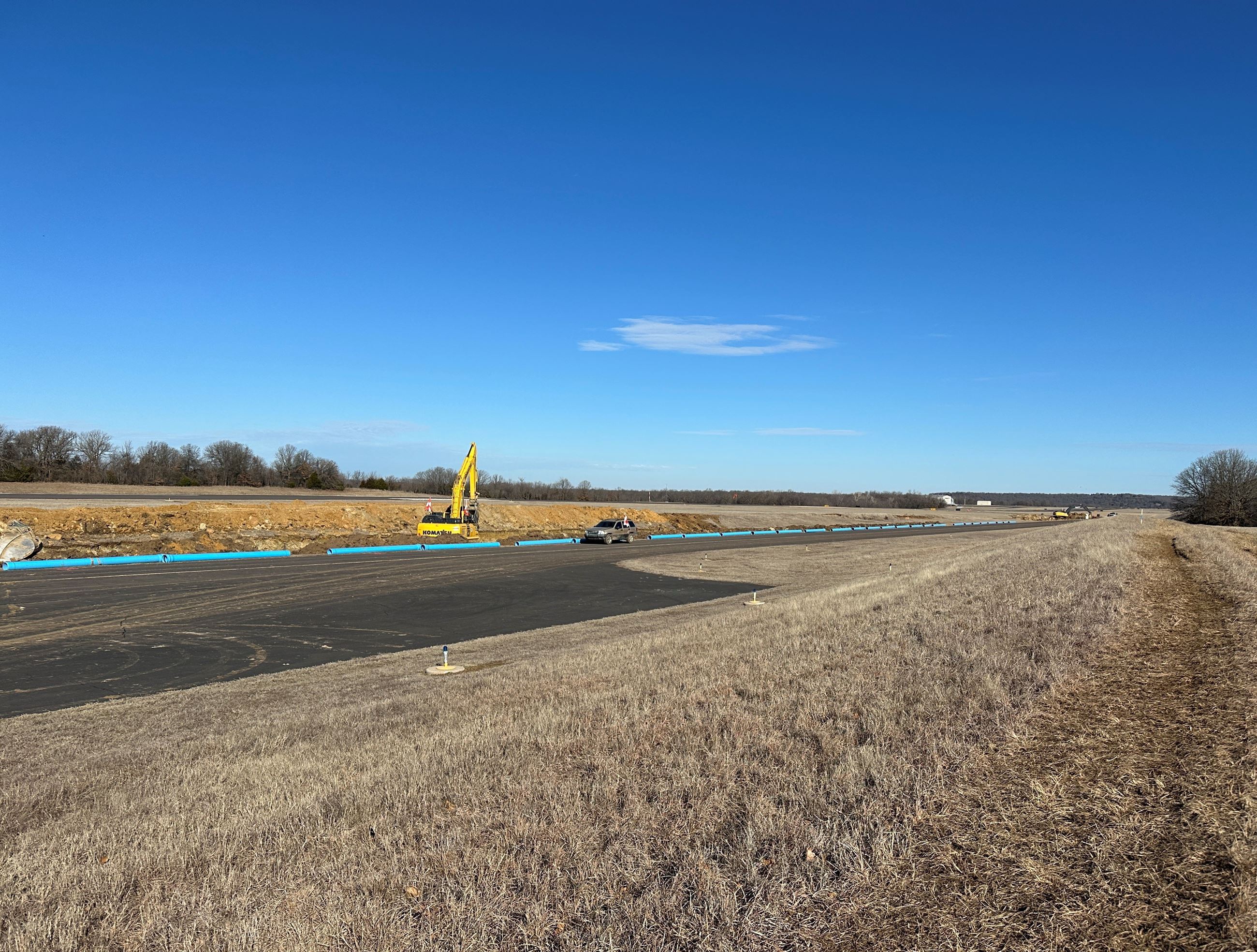 looking NW from E side of runway near S end